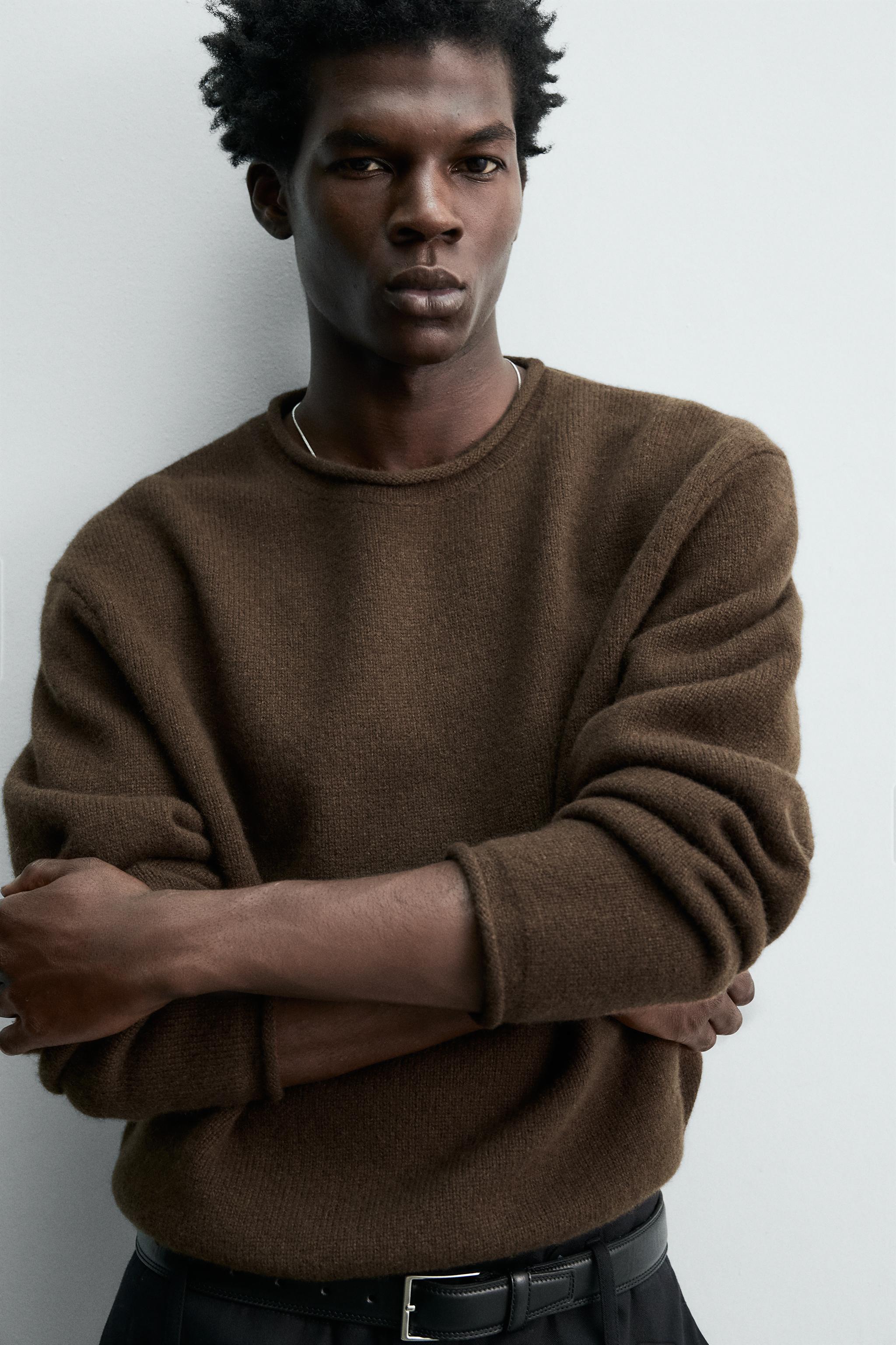 100% WOOL ROLLED-EDGE SWEATER